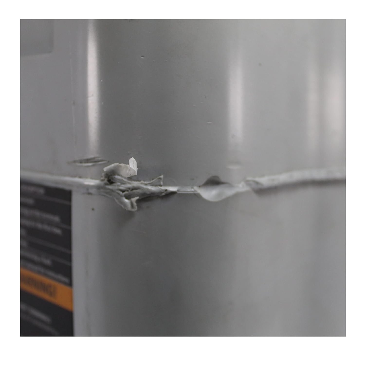 Close-up of the side of the IOXUS UltraCapacitor module showing a seam with some cosmetic imperfections or damage.