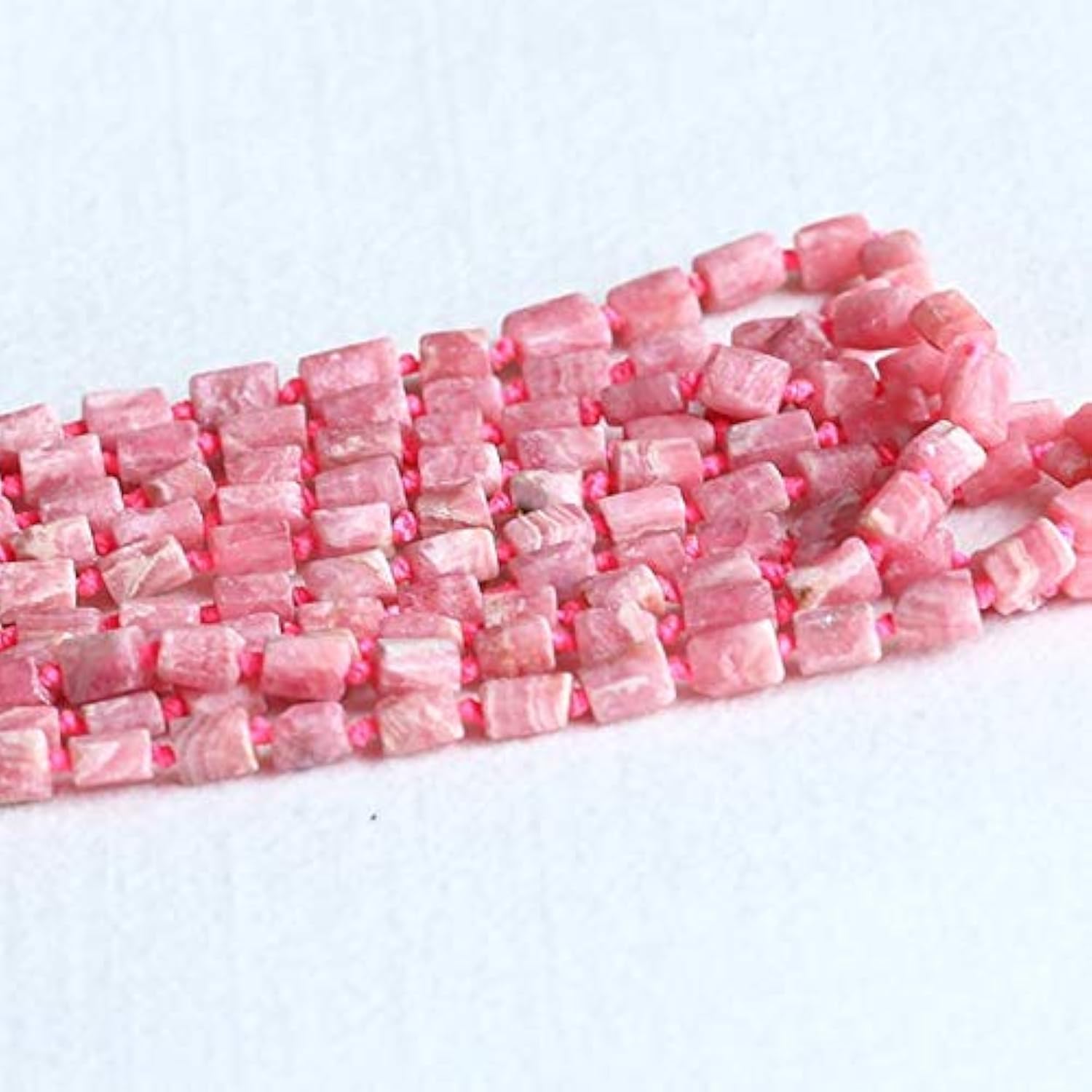 Rhodochrosite d'Argentine haut de gamme, perles facettées main de 5-7mm