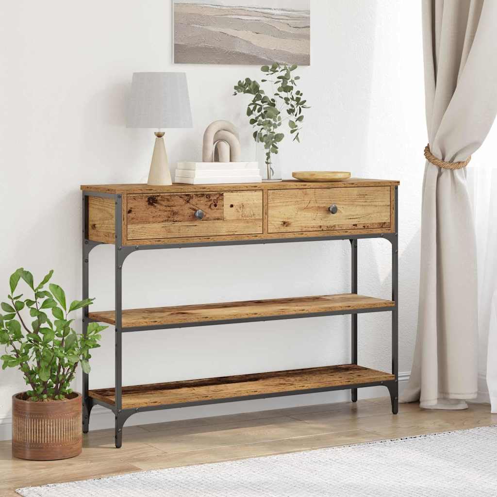 Mesa consola con estante y cajones en madera recuperada para un salón de diseño rústico