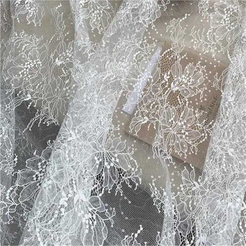Tissu africain brodé de paillettes ivoire 150cm pour couture