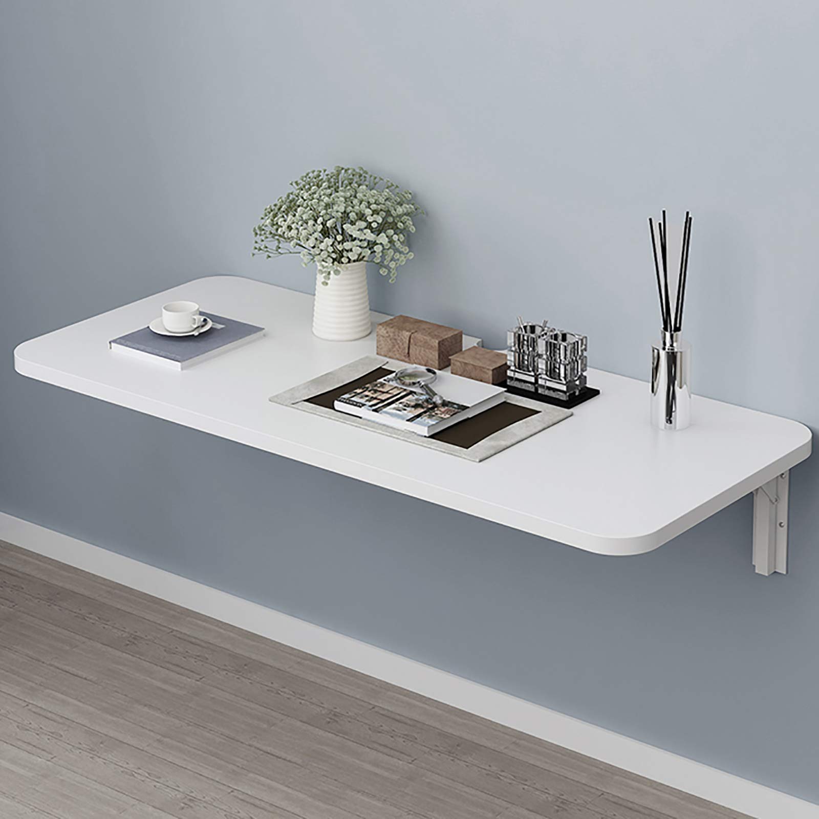 Table pliable murale rabattable petit bureau flottant gain de place