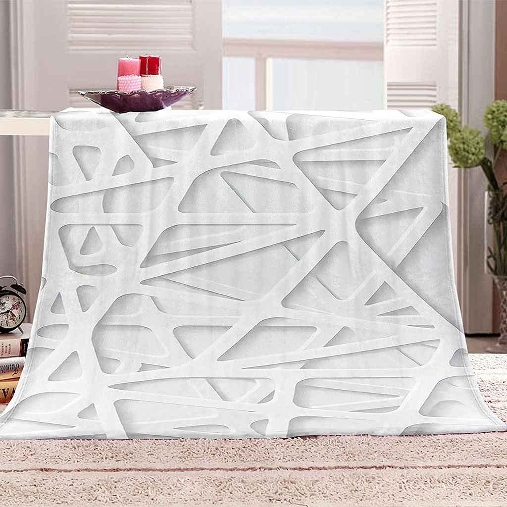 Couverture flanelle rayures blanches pour créer un cocon douillet chez soi