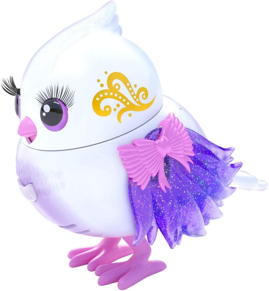 Little Live Pets Bird Tweeterina in its retail packaging, showing the bird inside a birdhouse-shaped box with 'I Talk Back!' and 'My Head Turns!' labels.