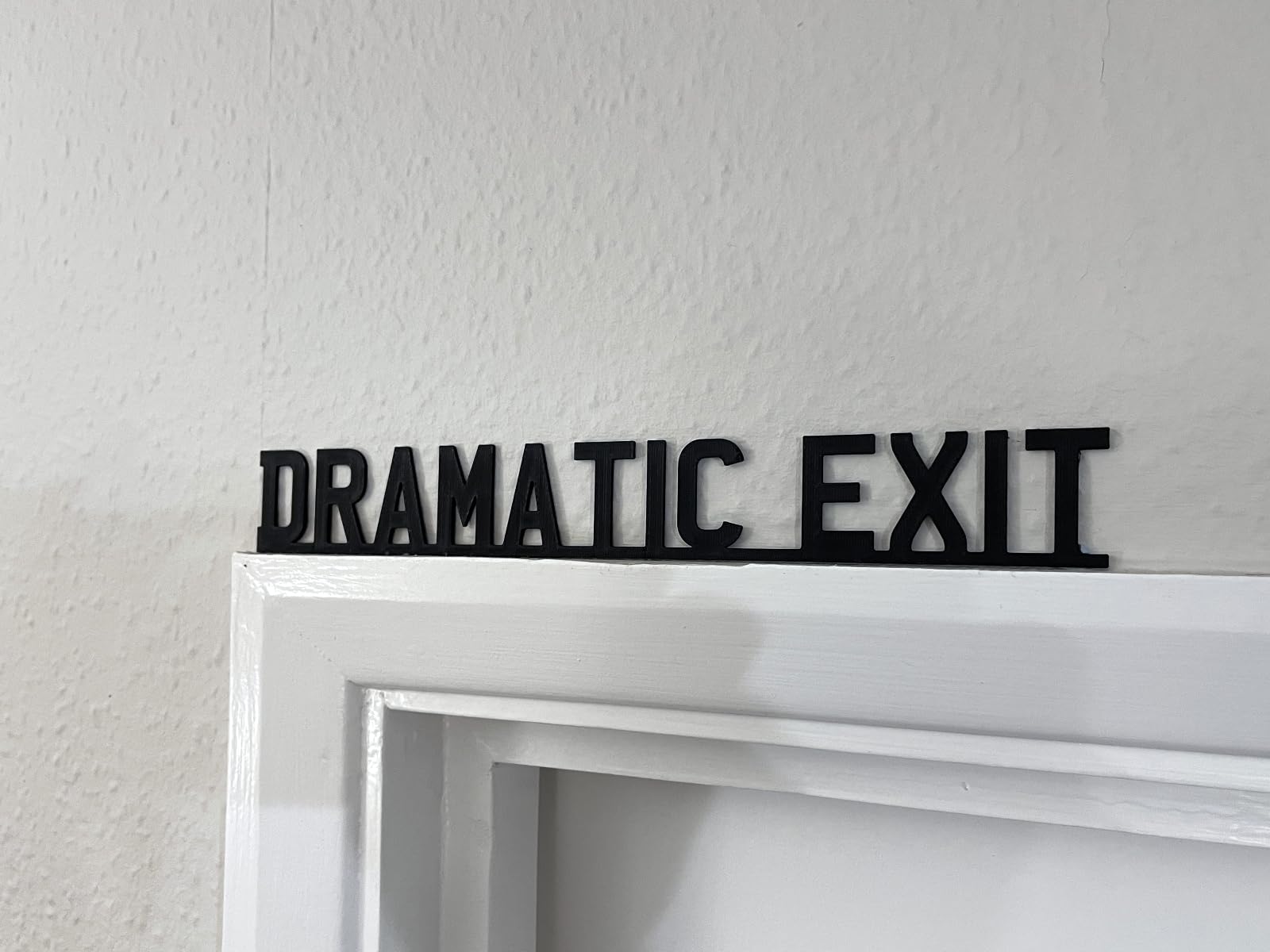 Dramatic Exit Wooden Script Sign โ Black Self-Adhesive Wall Decor for Hallway, Home Door, or Entryway โ Humorous and Stylish Corner Decoration for Modern Interiors (White)
