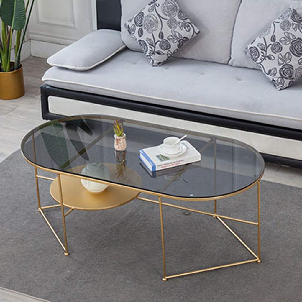 Table basse créative en verre trempé de sécurité et structure dorée haut de gamme
