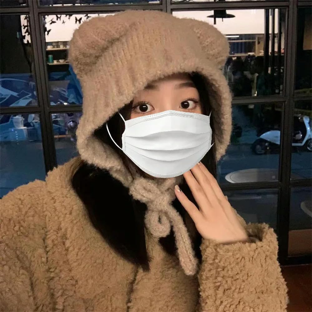 Bonnet en laine femme mignon à cravate, l'accessoire tricoté idéal pour vos promenades d'hiver