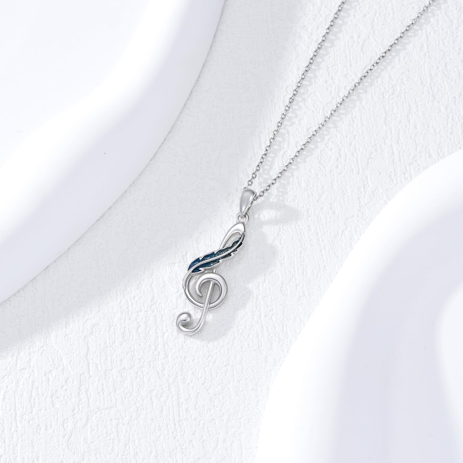 Collana con note musicali in argento Sterling con piuma e chiave di violino