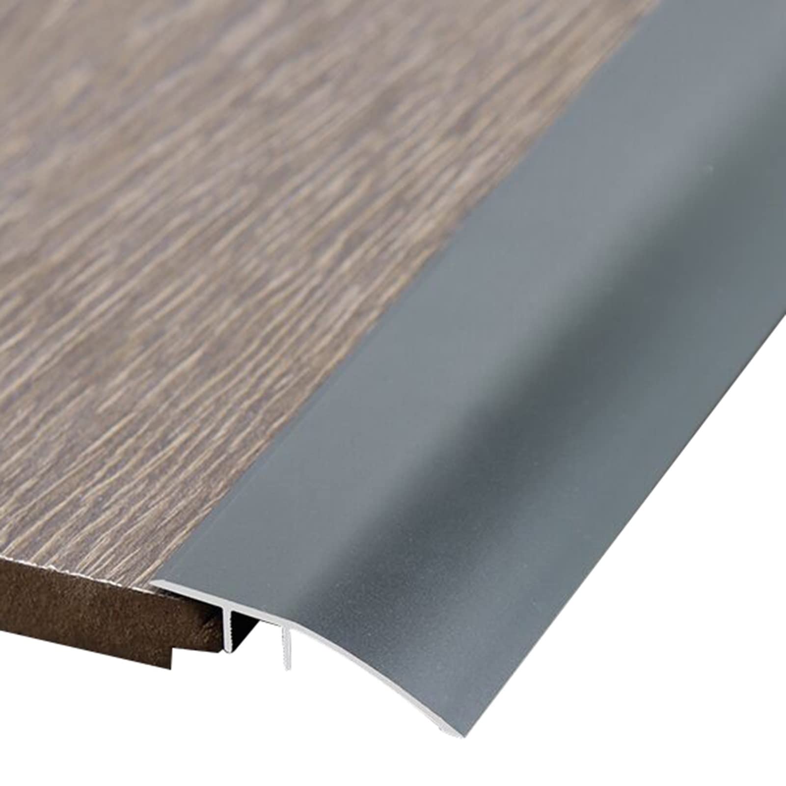 Bande de transition de plancher pour seuil de porte dénivelé
