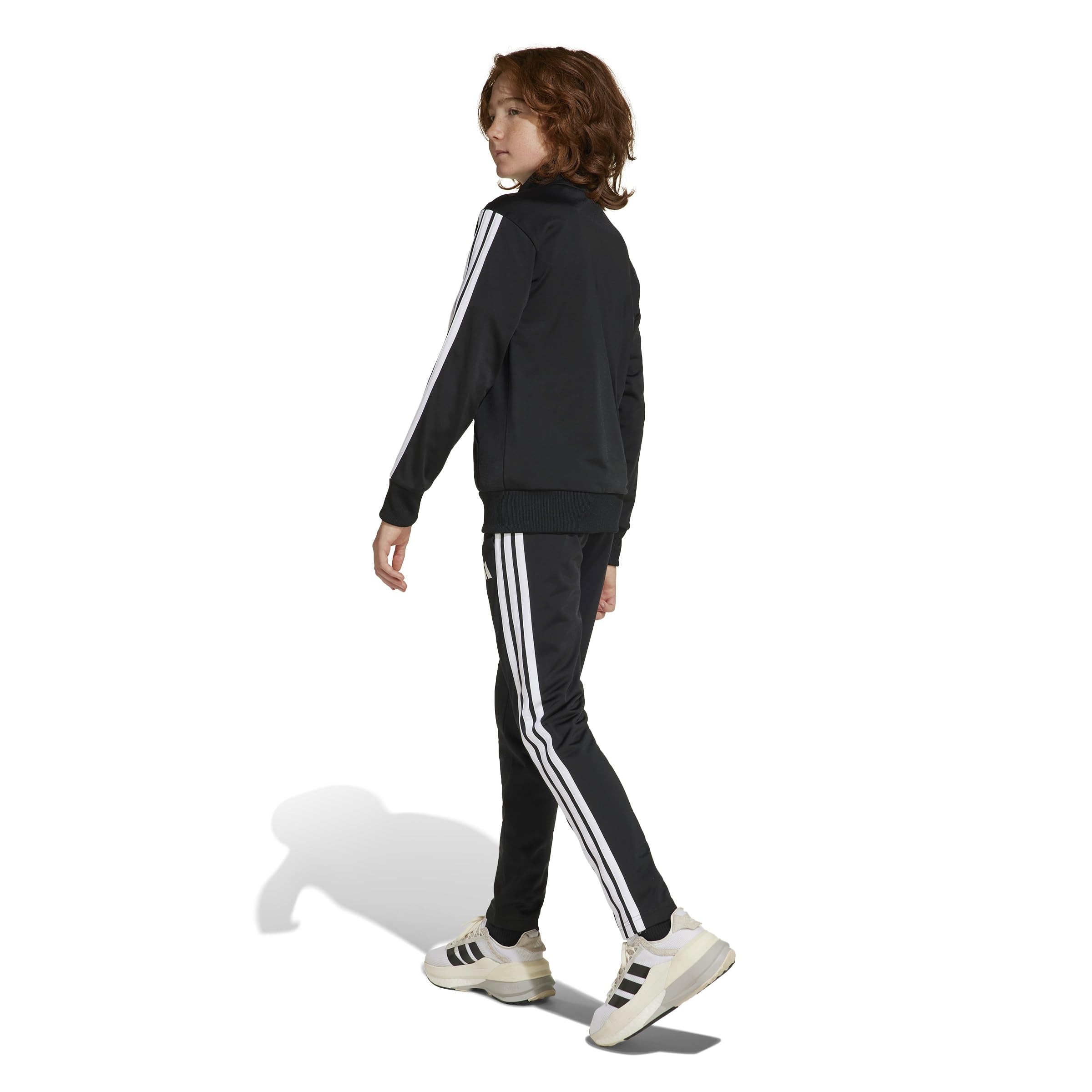 Vue rapprochée du tissu maille du survêtement adidas Tiberio pour enfants, mettant en évidence la texture et les 3 bandes emblématiques.