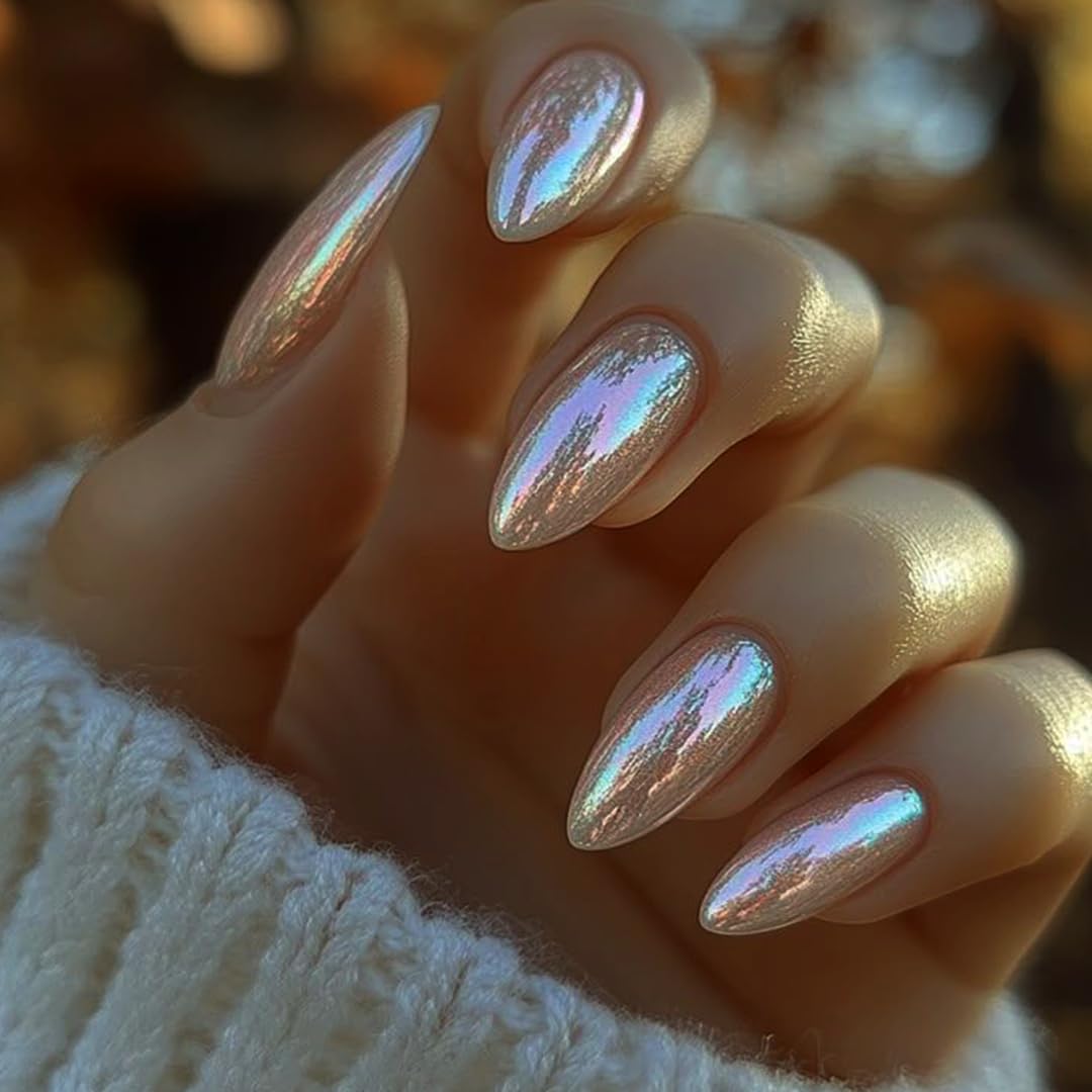 Champagne chrome medium almond press-on nails with a pearlescent mirror finish