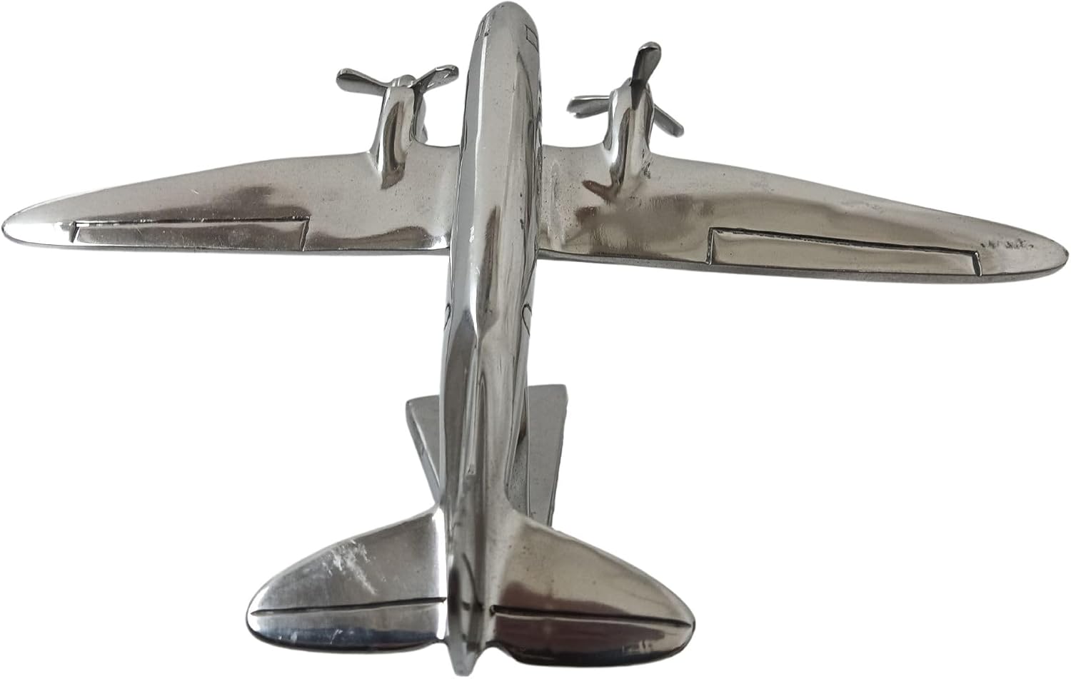 SK Style DC3 Dakota Propeller Airplane Ornament On Display Stand. Iconic vintage aircraft model With A Hand Polished Silver Finish And 29cm Wiingspan.