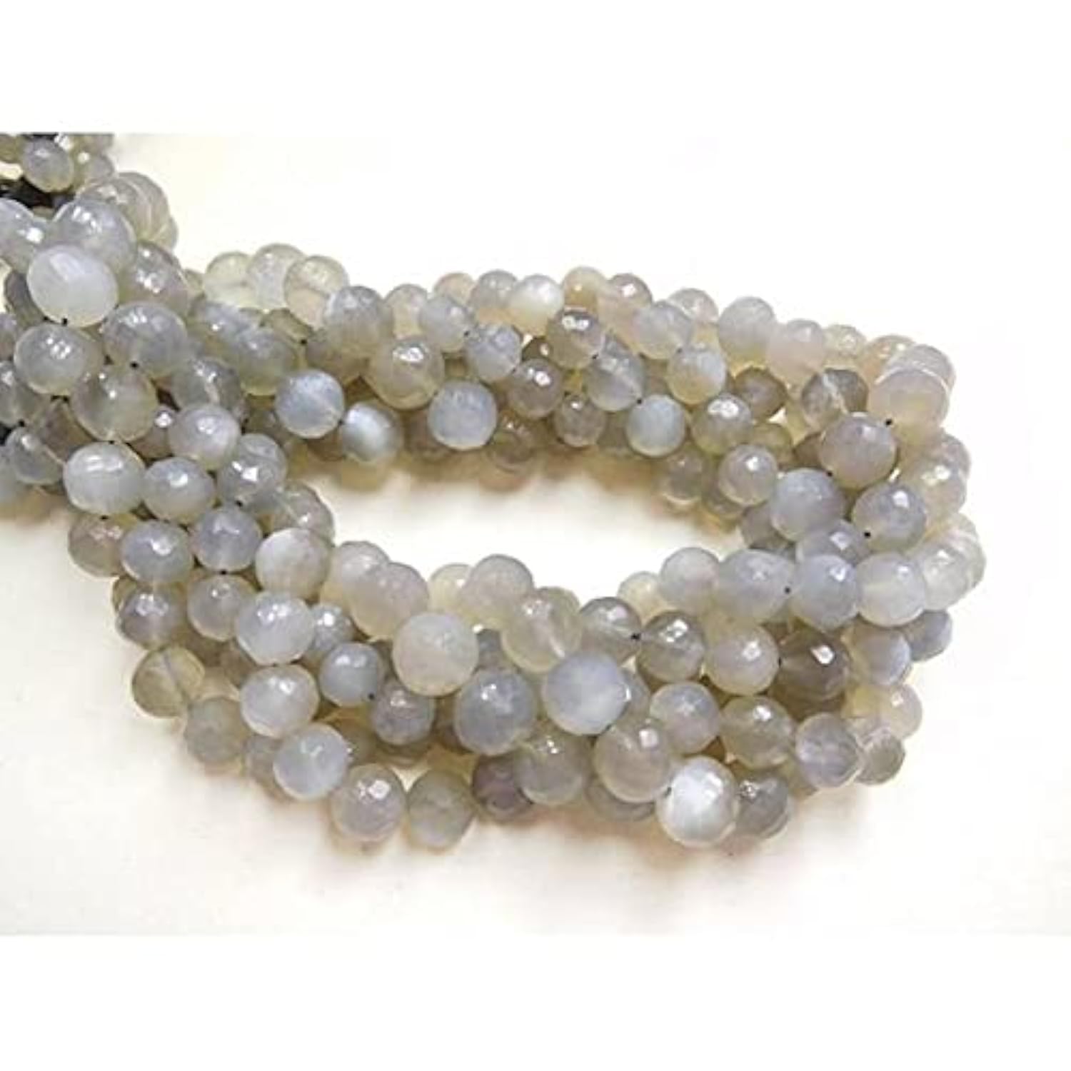 Pierre de lune grise perles micro-facettées de 7-8 mm pour joaillerie fine d'exception