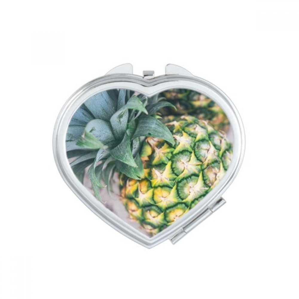 Miroir de poche motif nature pour retouches maquillage en voyage