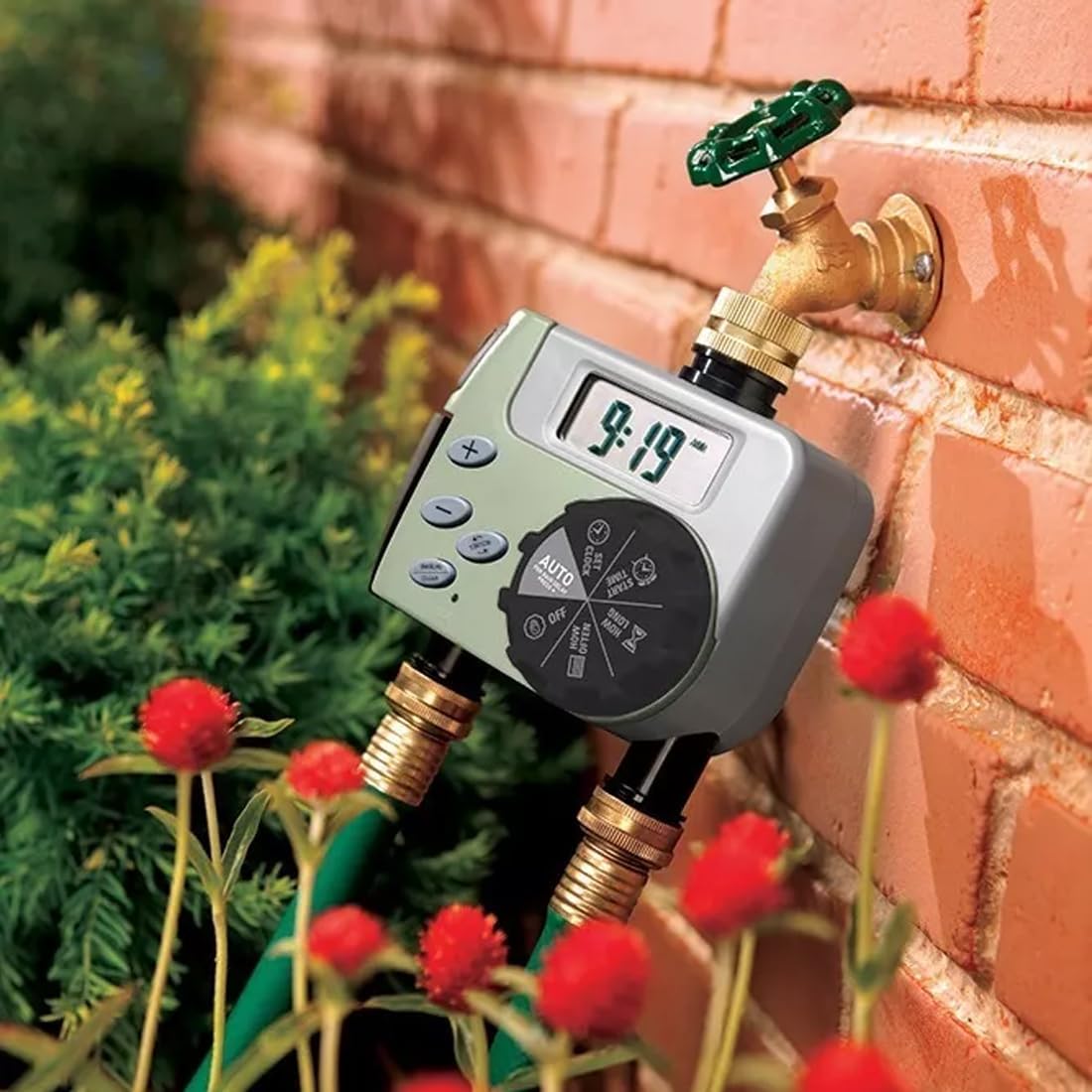GNCGarden Orbit Buddy II irrigation programmer with two hoses connected to its outlets, attached to a faucet.