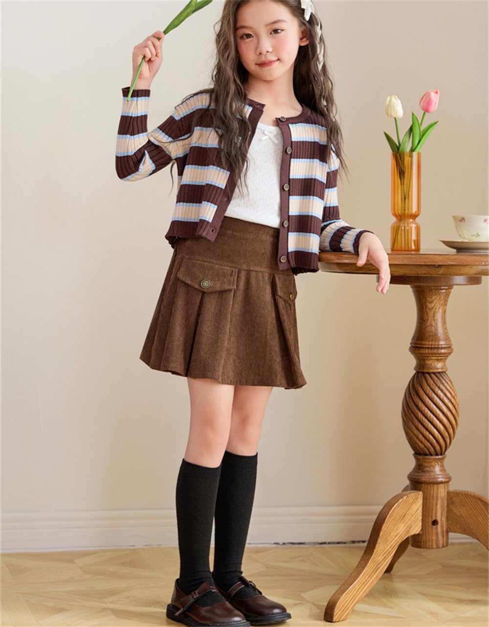 Gonna a pieghe autunno inverno per bambina Gonna a pieghe tinta unita Gonna a trapezio con bottoni in corda per bambina