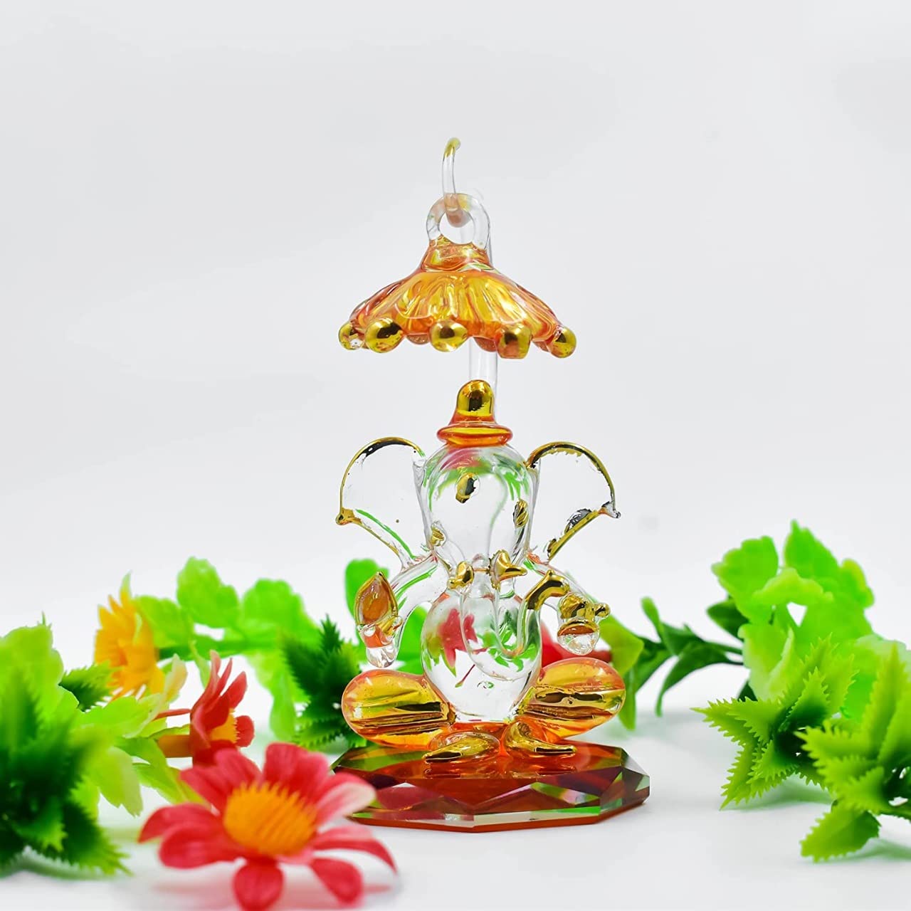 JAGAT JANNI ENTERPRISES Yellow and Transparent Double Sided Crystal Car Ganesha Showpiece