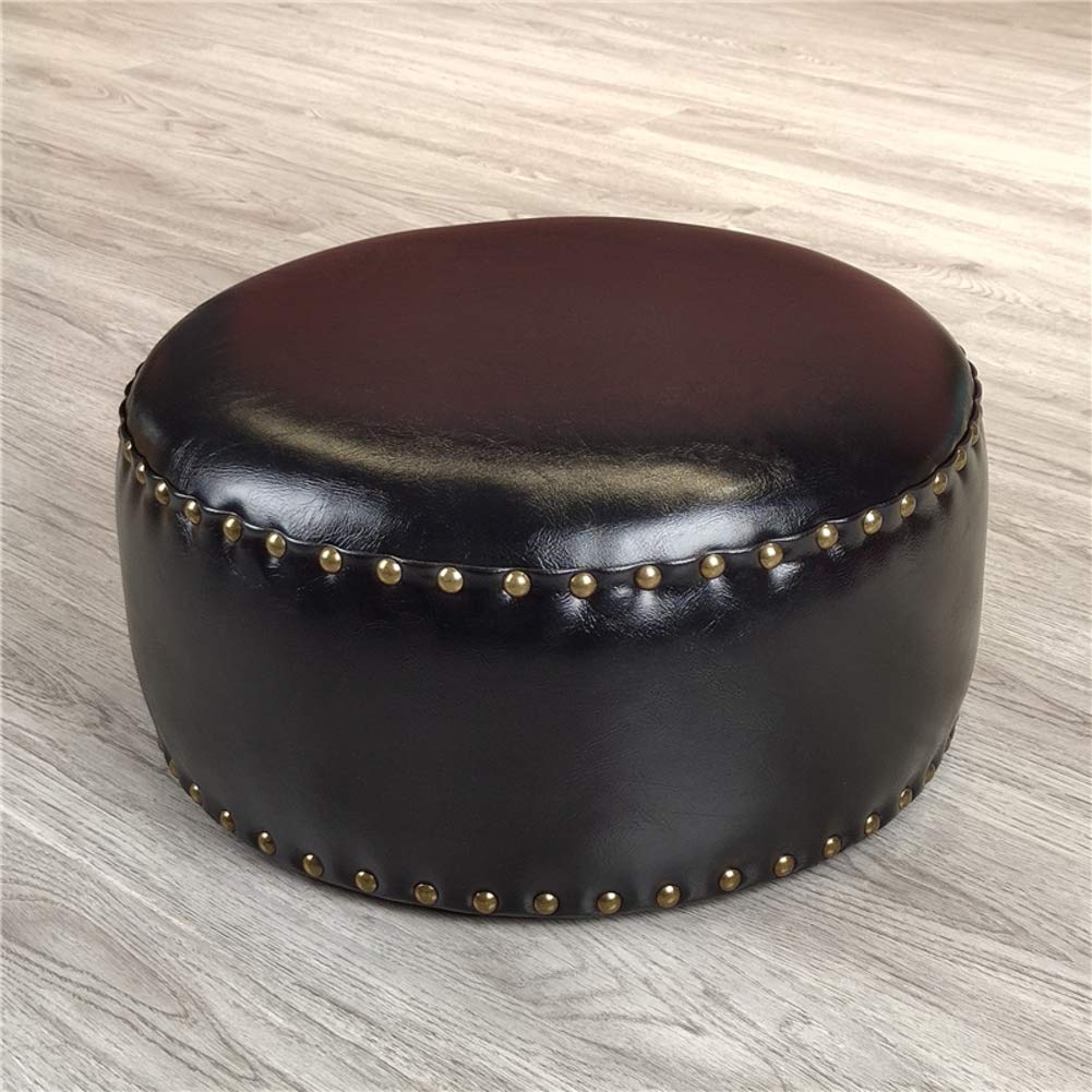 Pouf repose-pieds en similicuir noir pour votre coin lecture