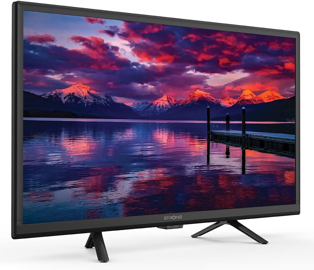 Strong SRT 24HE4023 TV mounted in a camper van, demonstrating 12V compatibility