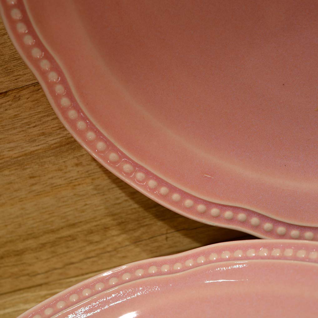 Vajilla Florencia Color Rosa Formada por 18 Piezas: 6 Platos Hondos, 6 Platos Llanos y 6 Platos Postre. Fabricada en gres vitrificado con esmalte brillante.