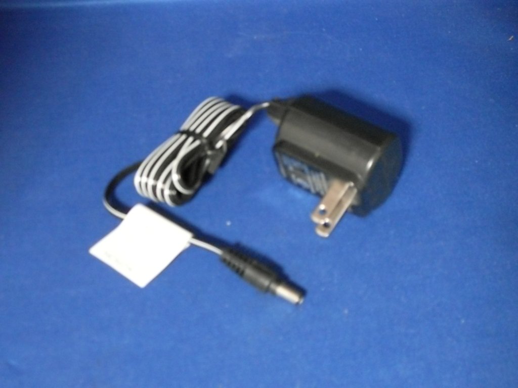 Homelite D-06550 Line Trimmer Battery Charger Genuine Original Equipment Manufacturer (OEM) Part