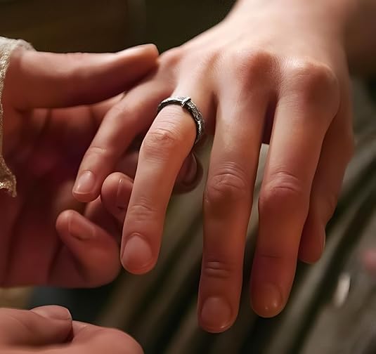 Celtic-style wedding ring inspired by Outlander, a romantic memorabilia gift for fans of Jamie and Claire.