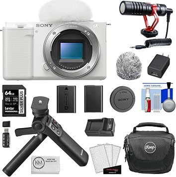 Sony ZV-E10 Mirrorless Camera | White Bundle with Sony GP-VPT2BT Wireless Shooting Grip + 64GB SD Card + Spare Battery and Charger + KC-25 Camera Bag+ Microfiber Cloth + Cleaning Kit + Microphone