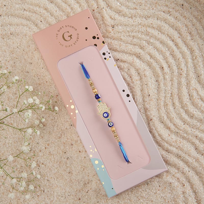 Image of THE GIFT STUDIO.COM | Premium Zircon Hamsa Hand Evil Eye Rakhi for Brother | Handmade Designer Rakhi | Blue & Gold Raksha Bandhan Thread |