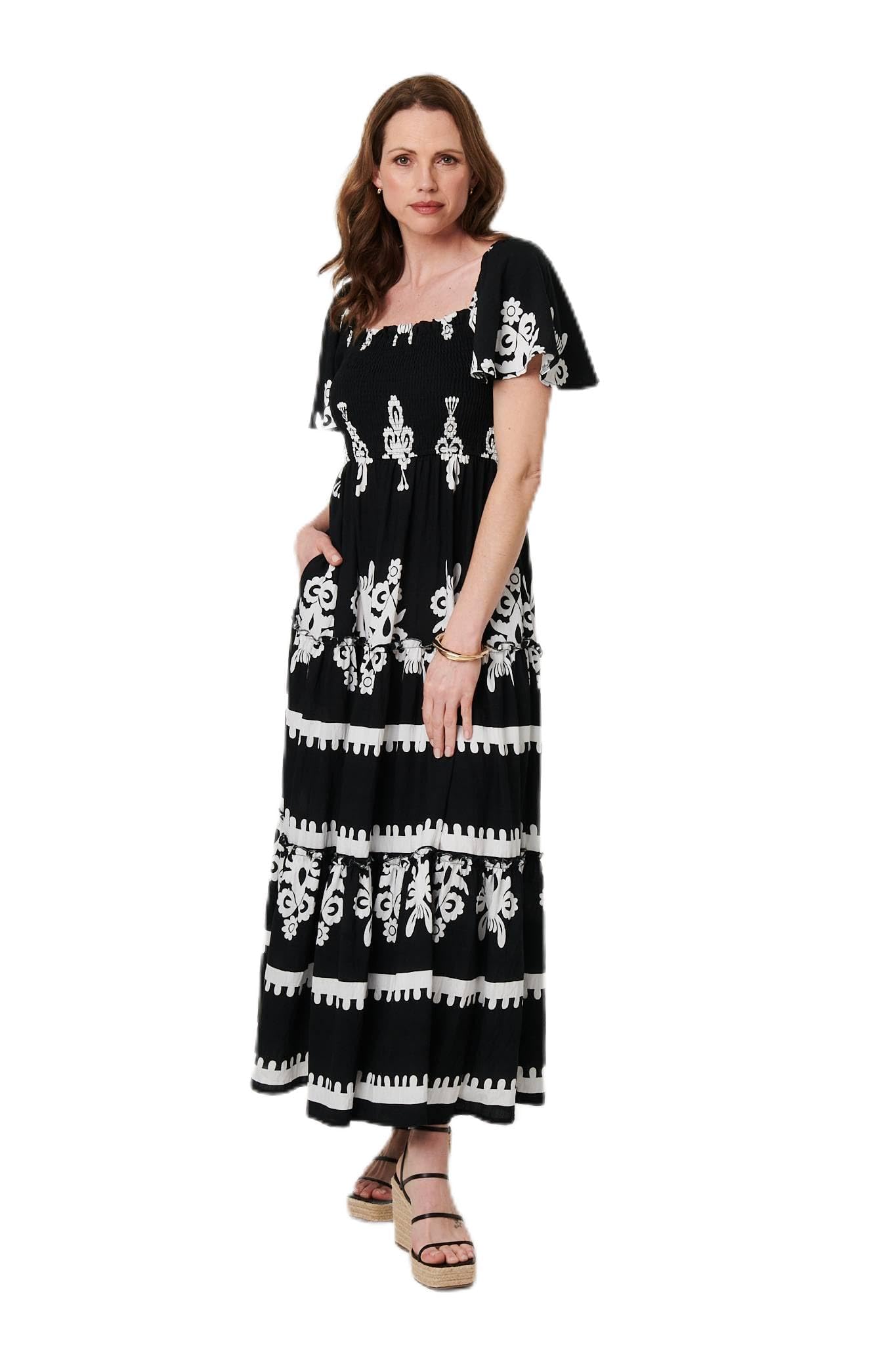 Izabel London Women's Black Ikat Print Short Sleeve Maxi Dress For Uk With A Shirred Bodice And Viscose Blend Fabric.