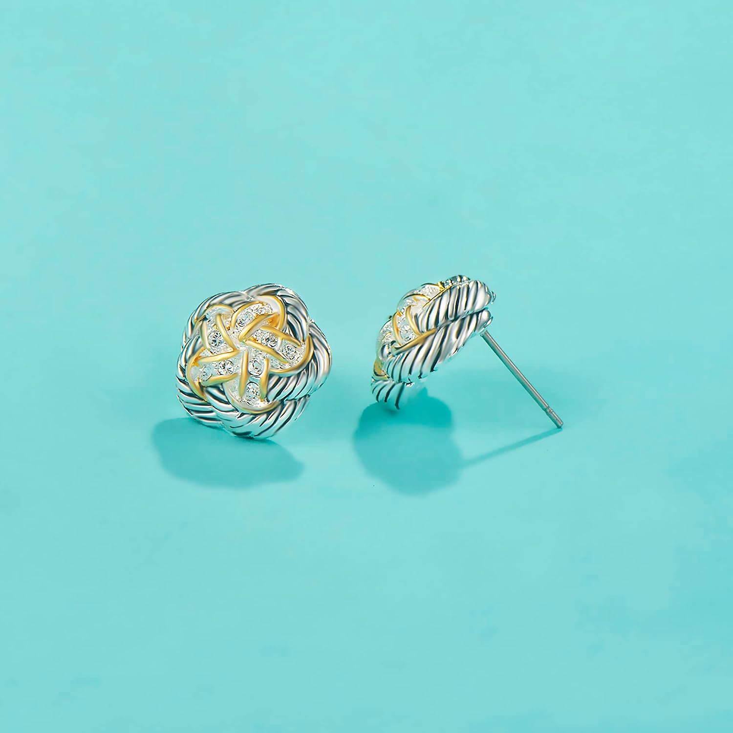 UNY Jewel Jewelry Make a Statement With Our Two Tone Twisted Cable Wire Flower Swirl Post Earrings Featuring Pave Rhinestone Detailing Perfect For Any Occasion