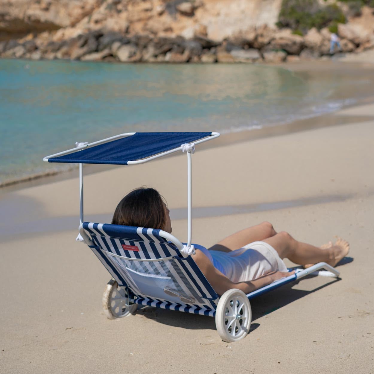 Flamingueo Chaise de Plage - Transat Pliable - 5 Positions - Parasol Réglable UPF 50+ - Oreiller Ergonomique - Convertible en Chariot de Transport - Bleu
