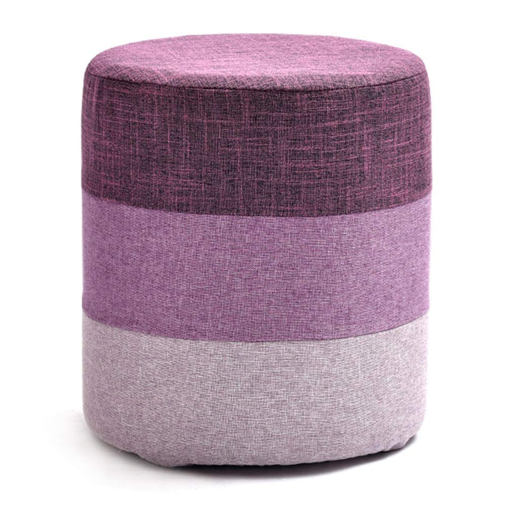 Tabourets ronds repose-pieds violet contre le manque d'espace