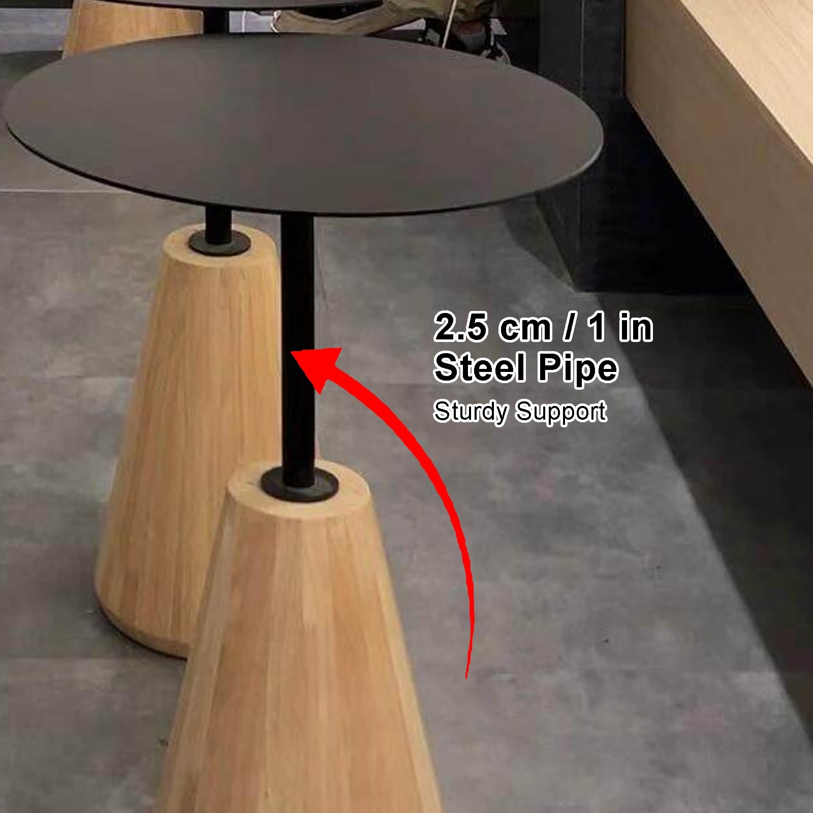 Tavolo da bar rotondo moderno con base affusolata in rovere massiccio e piano in ferro verniciato per bistrot
