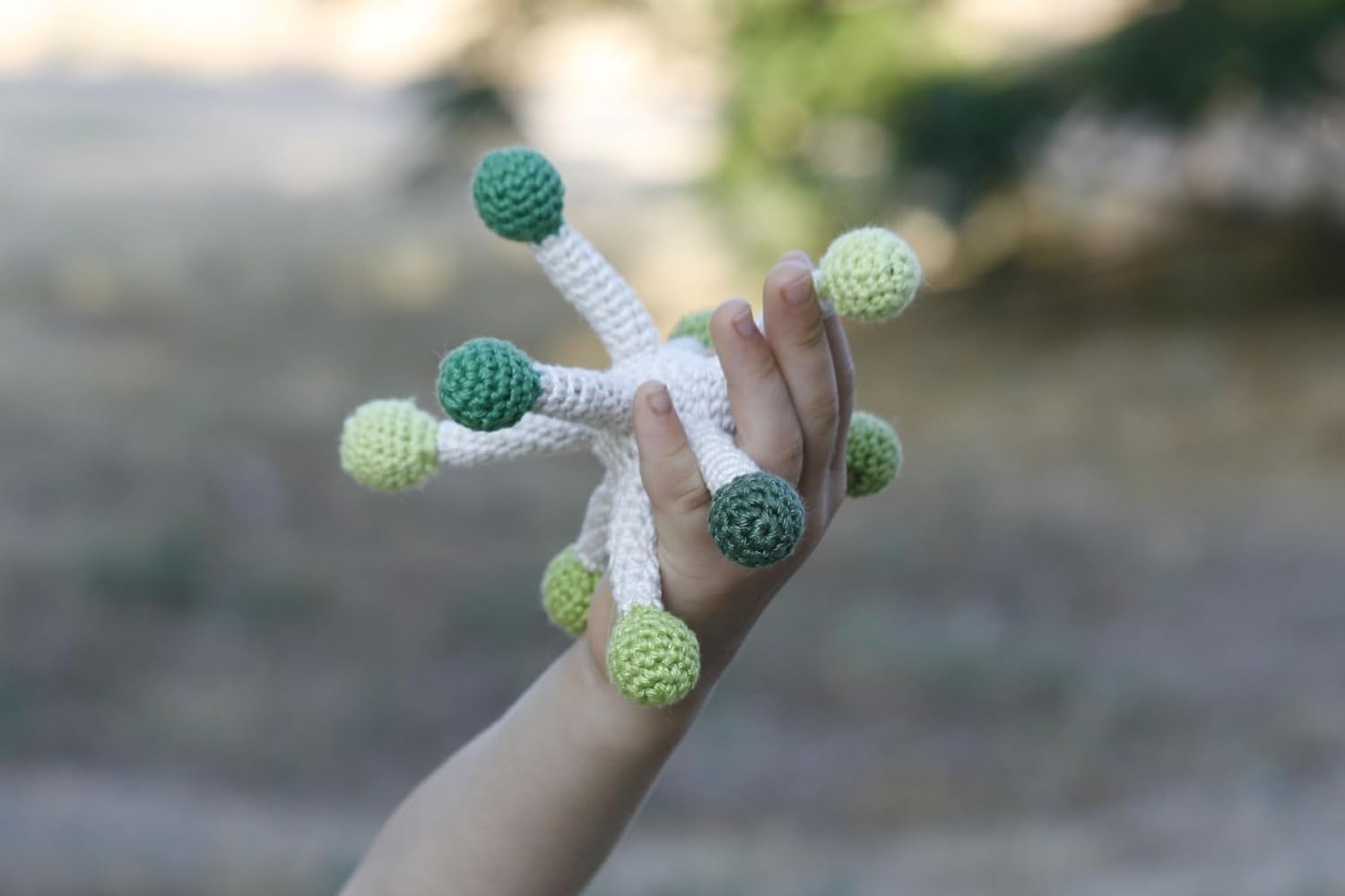 Whispering Dandelion Crochet Rattle, Soft Modern Toy in Green and Off-White, Handmade by TomToy