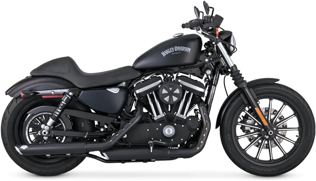 Side view of a black Harley-Davidson Sportster with Vance & Hines Twin Slash Round Slip Ons. The image provides a full profile of the motorcycle and the exhaust system.