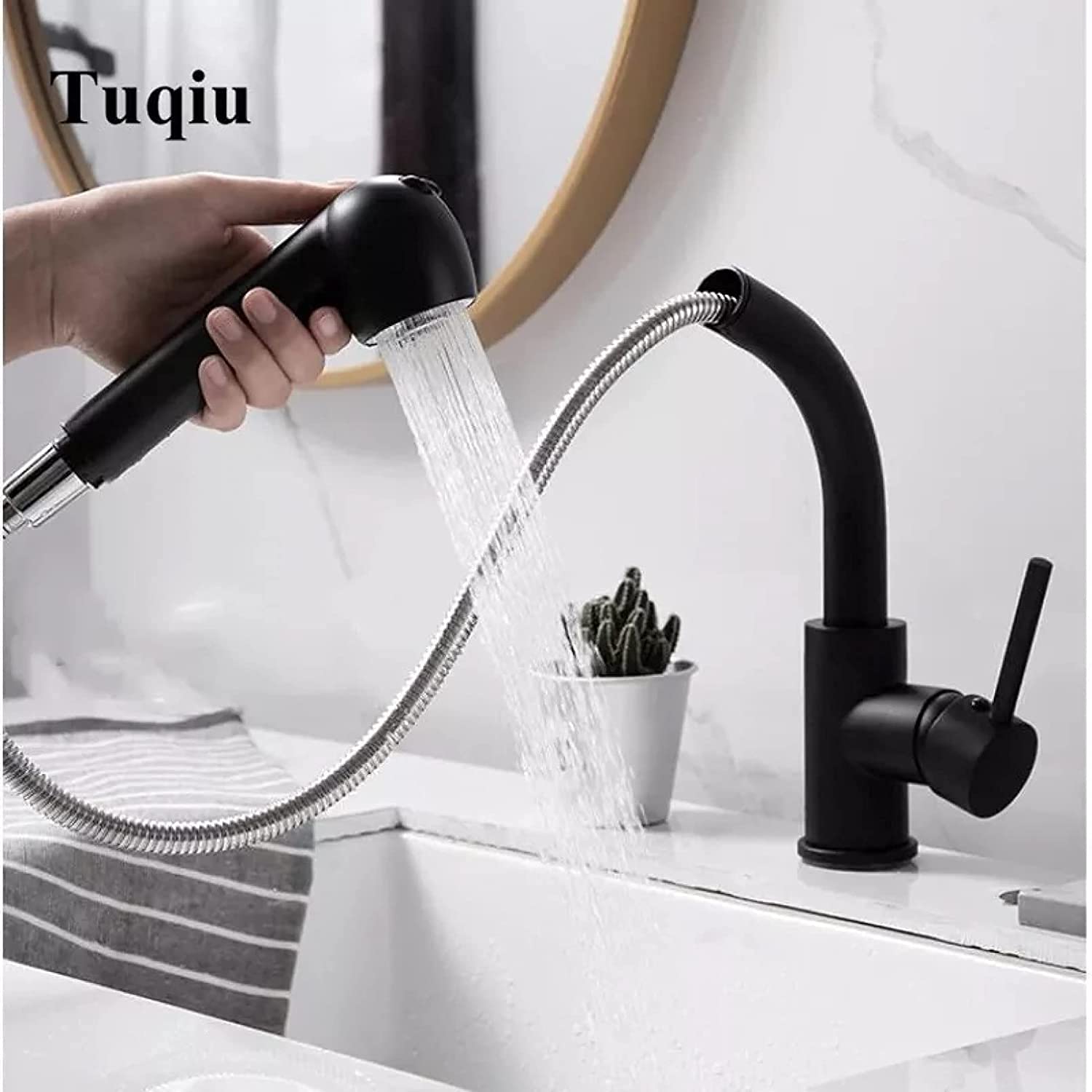 Mitigeur de cuisine noir extractible avec douchette rotative 360
