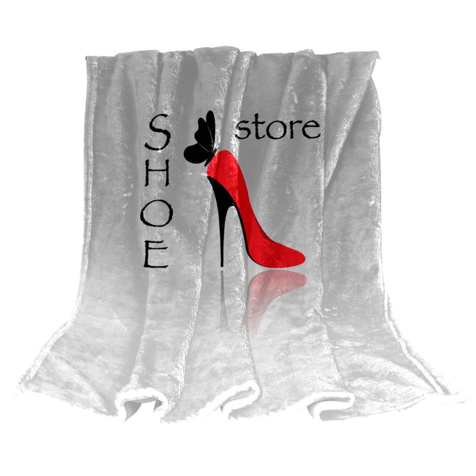 Couverture polaire rouge à motifs talons hauts pour vos soirées canapé