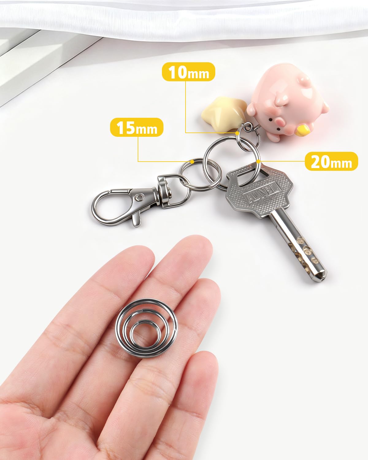 CORTNEY Set van 100 kleine sleutelhangers hoepels, 25 mm, zilveren ronde metalen splitringen voor thuis sleutels, organisatie en ambachtelijke maken CORTNEY Set van 100 kleine sleutelhangers hoepels, 25 mm, zilveren ronde metalen splitringen voor thuis sleutels, organisatie en ambachtelijke maken