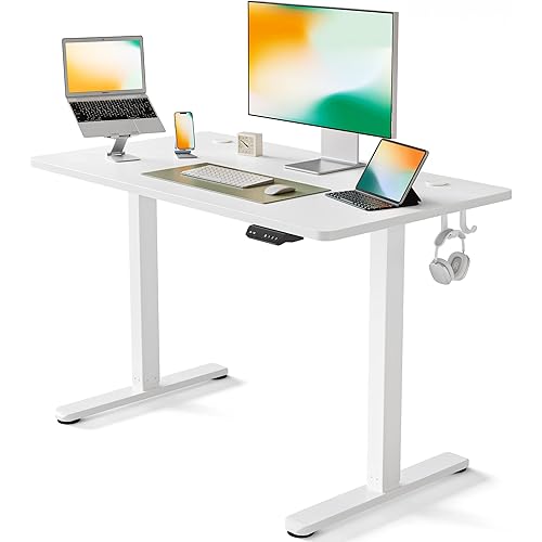 FEZIBO Height Adjustable Electric Standing Desk, 40 x 24 Inches Stand Up Table, Sit Stand Home Office Desk with Splice Board, White Frame/White Top