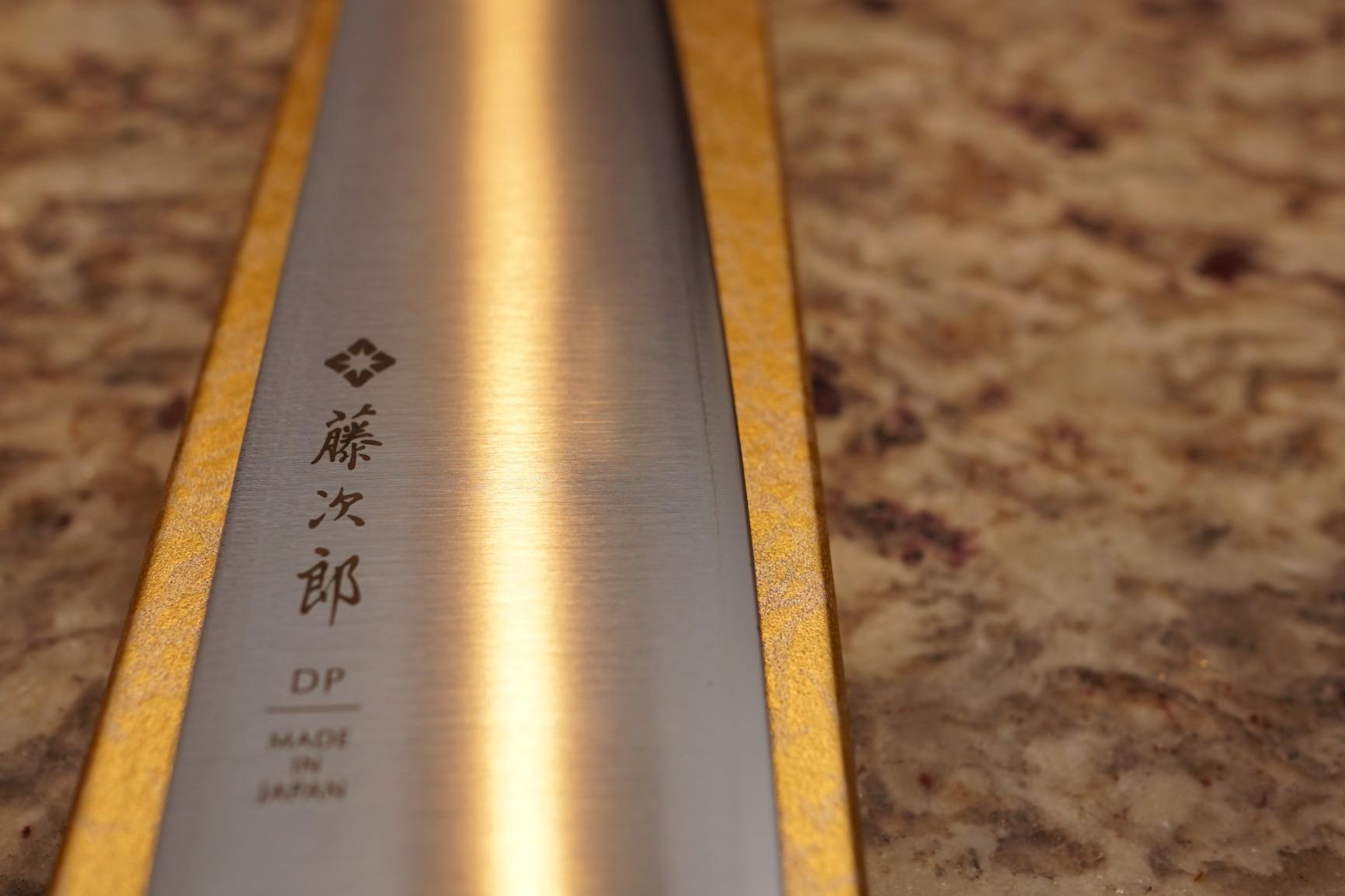 Nakiri knife set displayed with a cutting board and fresh produce