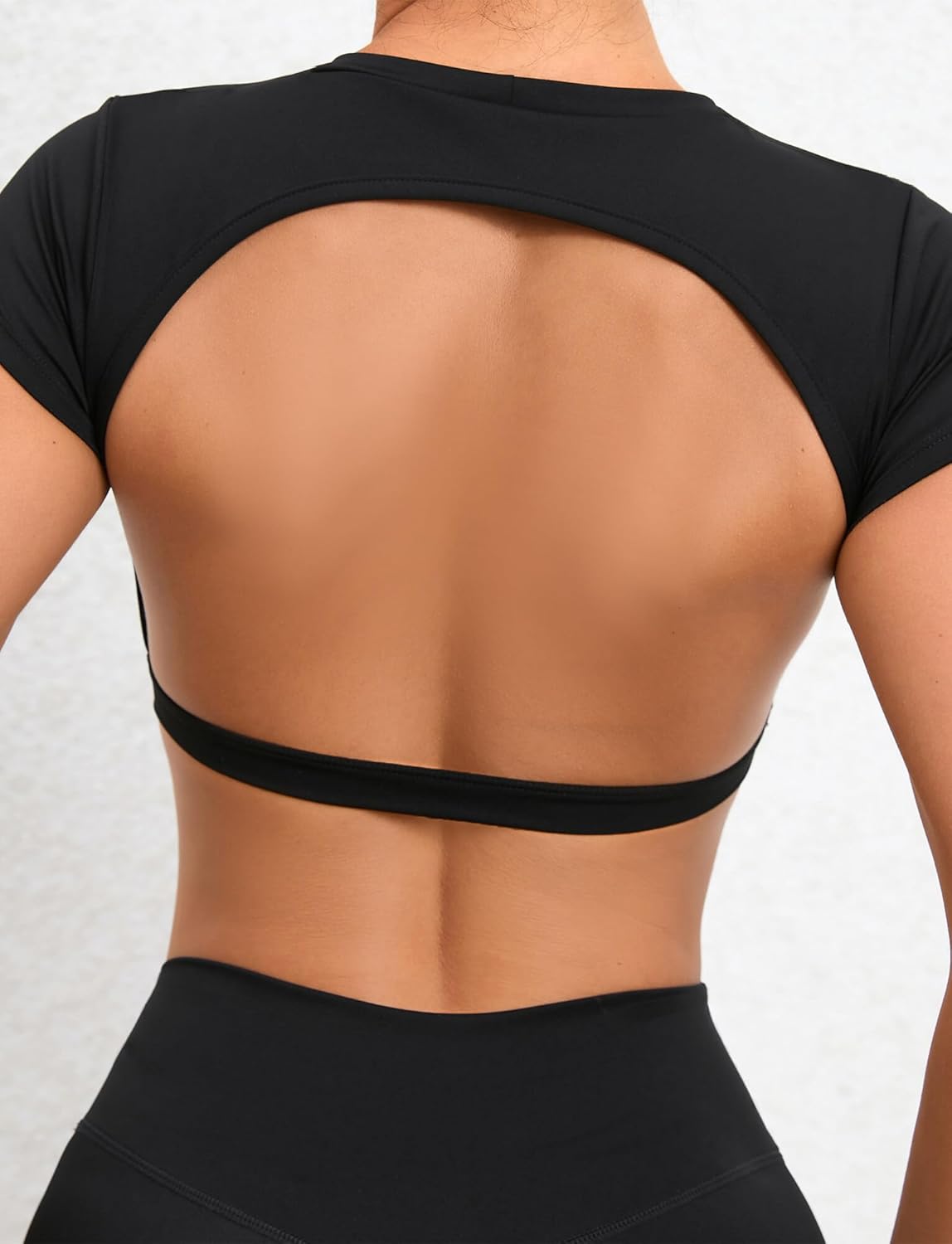 FEOYA Women’s Open Back Crop Tops Short Sleeve Slim Fit Gym Workout Tops with Pads Soft Yoga Fitness Activewear - Image 3