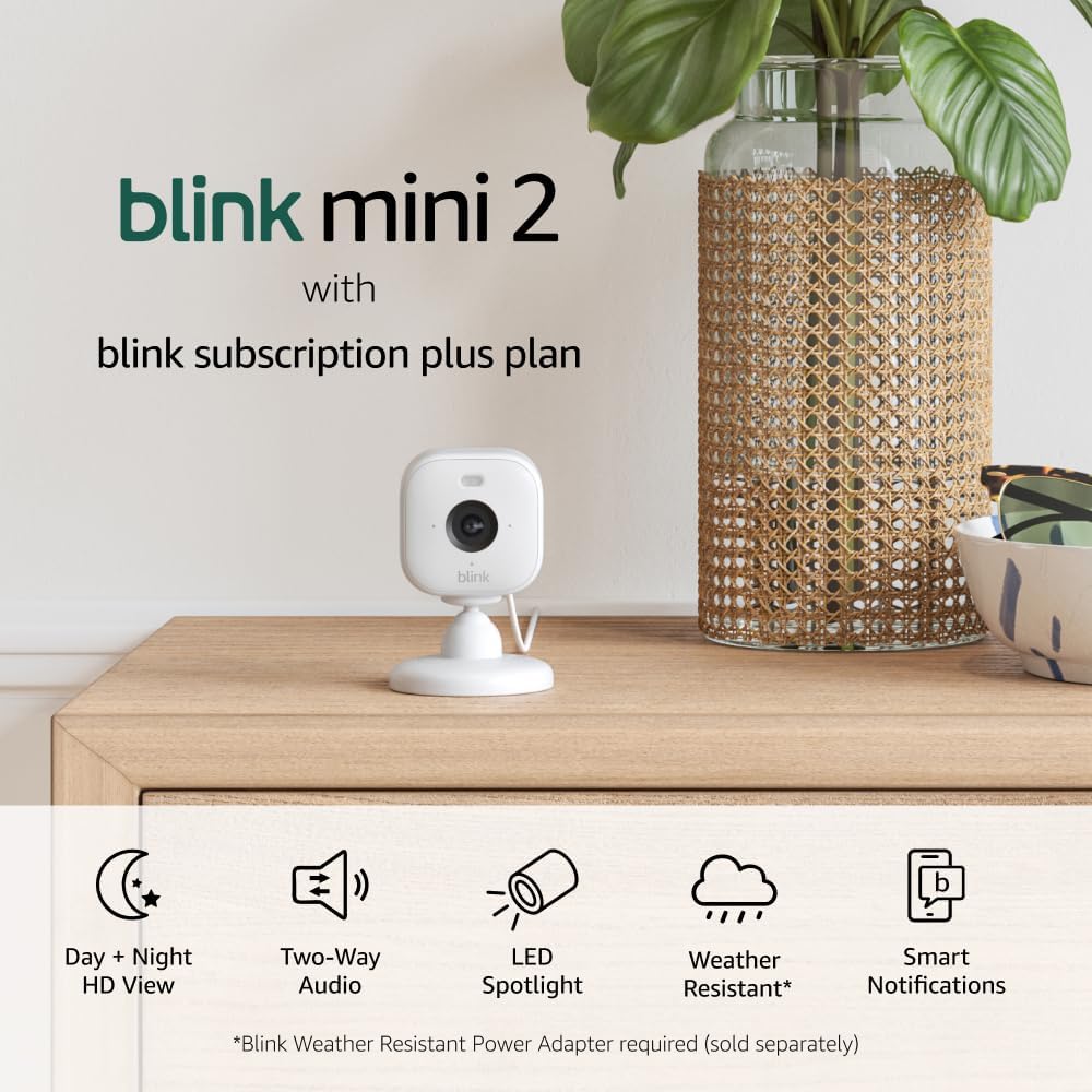 Blink Mini 2 with 1-Year Plus Subscription, 2 Cameras (White) — Plug-in smart security camera, HD night view in color, built-in spotlight, motion detection, Works with Alexa