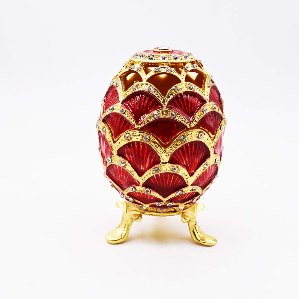 Petite statue oeuf rouge miniature pour decoration de tableau de bord