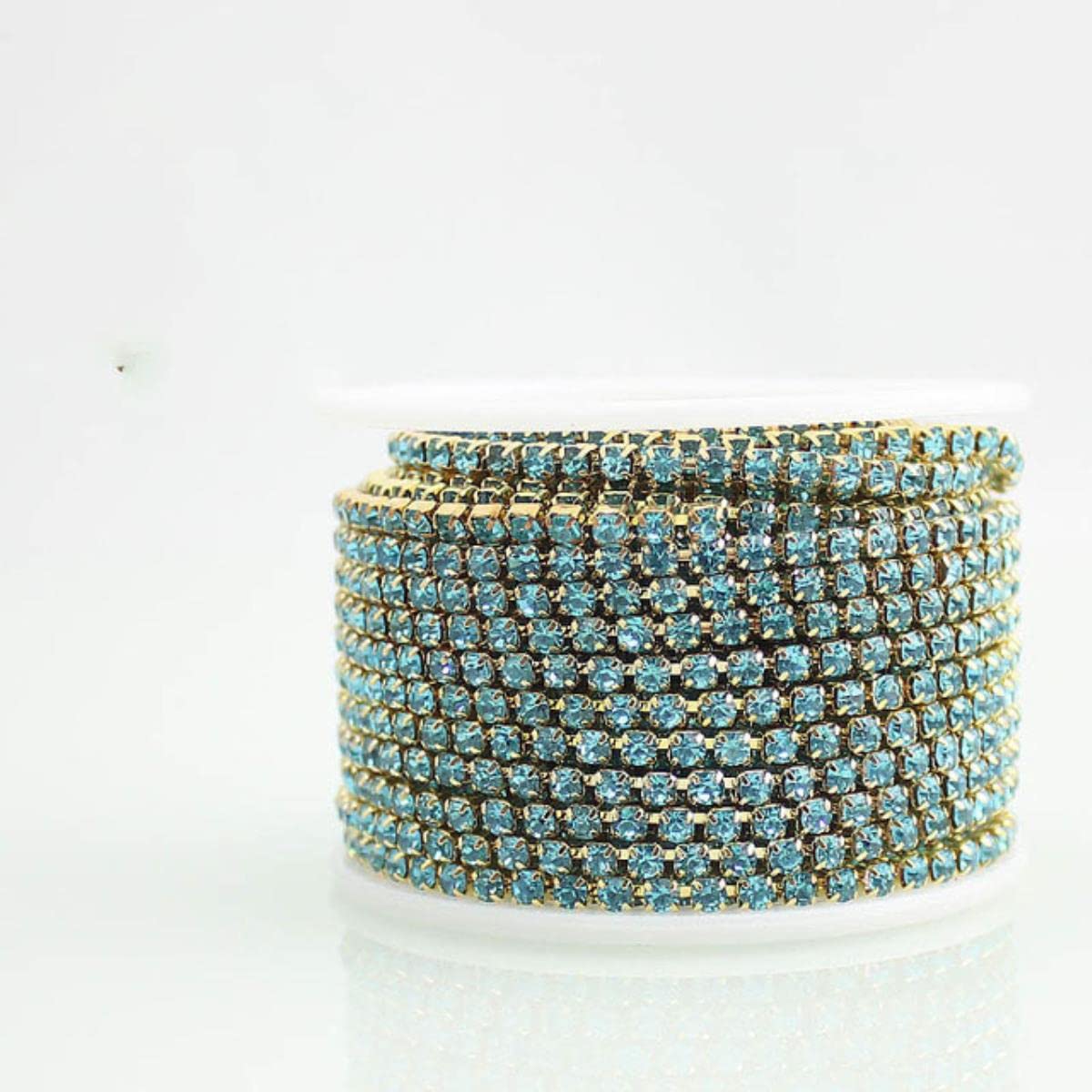 Strass en chaîne SS12 aigue-marine 3mm cristal de haute brillance base or 10m
