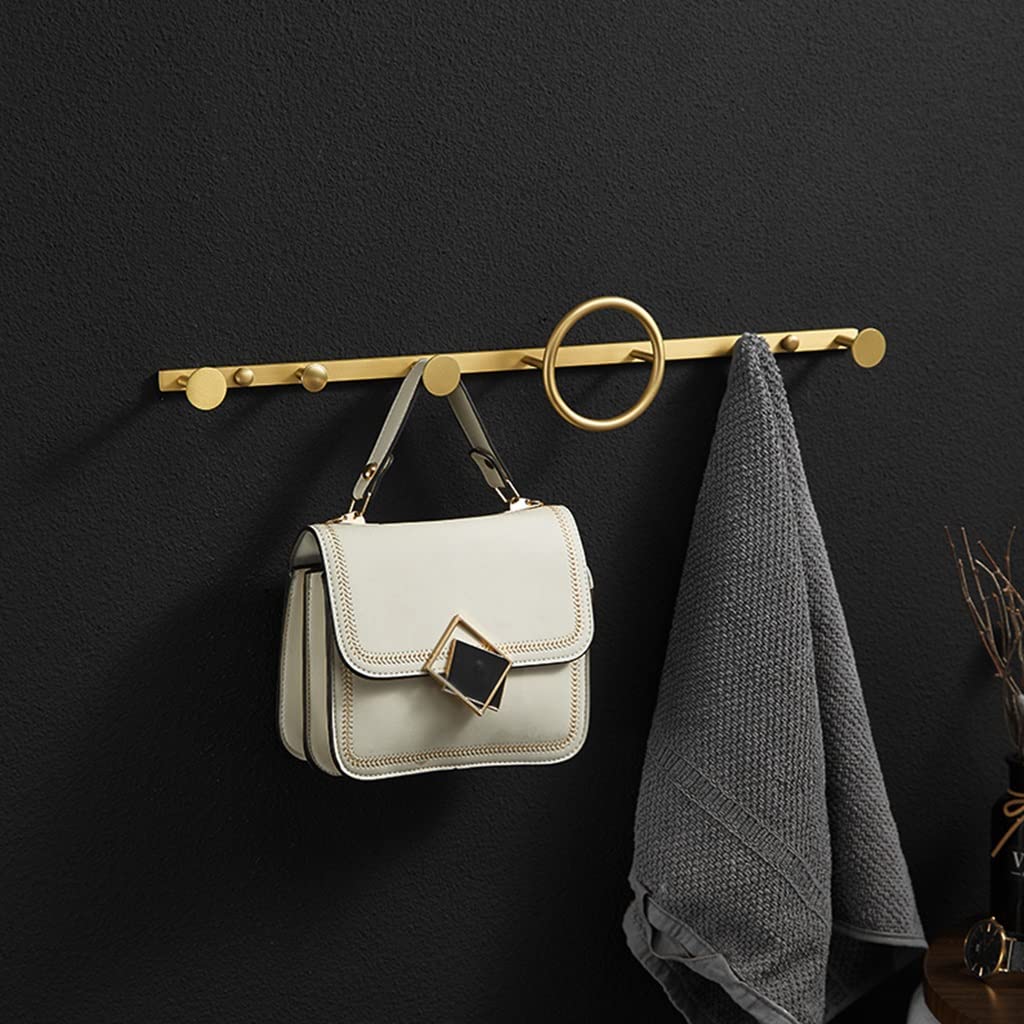 Porte-serviettes laiton et étagère murale pour une salle de bain zen