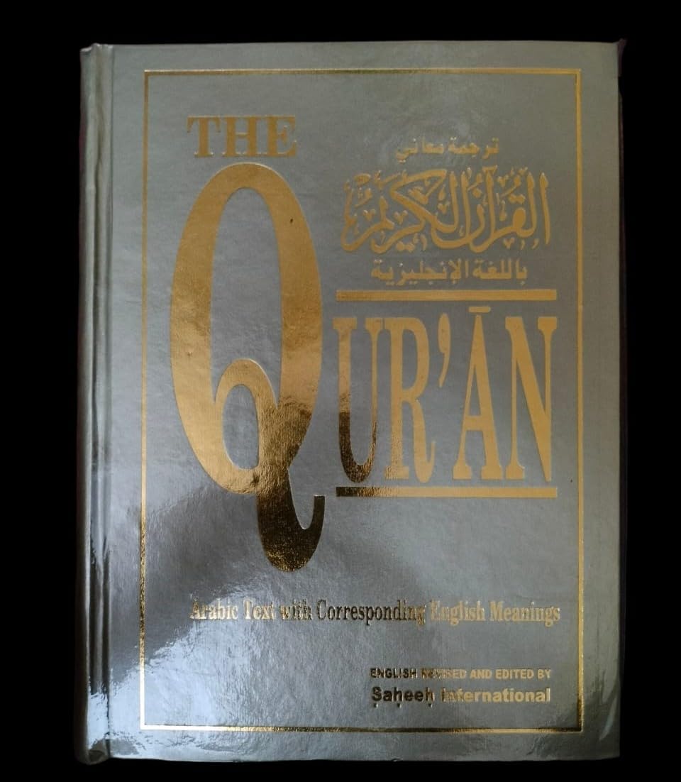 THE QURAN ( ARABIC TEXT WITH CORRESPONDING ENGLISH MEANING ) ENGLISH REVISED AND EDITED BY SAHEEH INTERNATIONAL WITH LARGE SIZE BOOK AND WELL-FURNISHED FRONT AND BACKCOVER INDIAN GOOD PRINTED QUALITY Hardcover – 1 January 1997