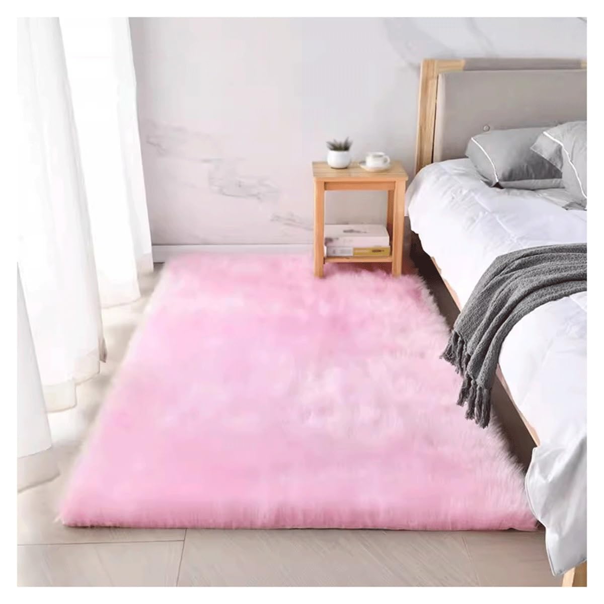Tapis de chambre d'enfant rose en fausse fourrure 70x90