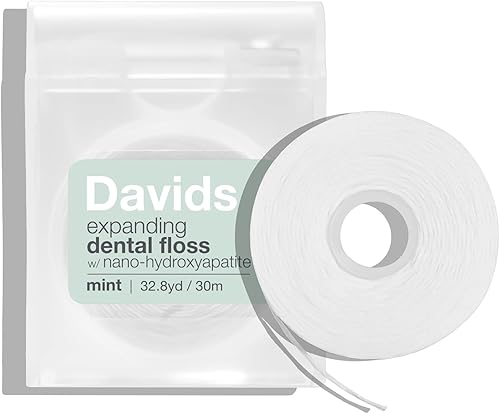 Davids Hilo dental expandible + repuesto con hidroxiapatita, hebras tejidas sin roturas, encerado, vegano, manteca de cacao y menta, apto para