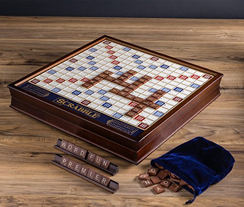 WS Game Company Scrabble Deluxe Edition Board Game Featuring a Rotating Wooden Game Cabinet with Built-in Storage and Raised Letter Tile Grid — Board Games for 2-4 Players (Ages 8+)