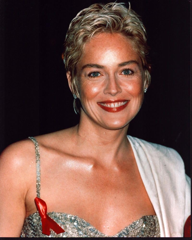 Amazon.com: Posterazzi Sharon Stone Close Up In Gold Gown With Red Ribbon  Pin Photo Print (16 x 20)