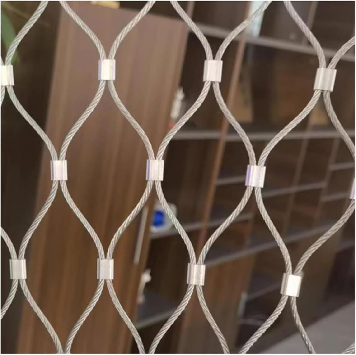 Filet de sécurité en acier pour sécuriser un balcon et créer un mur végétal